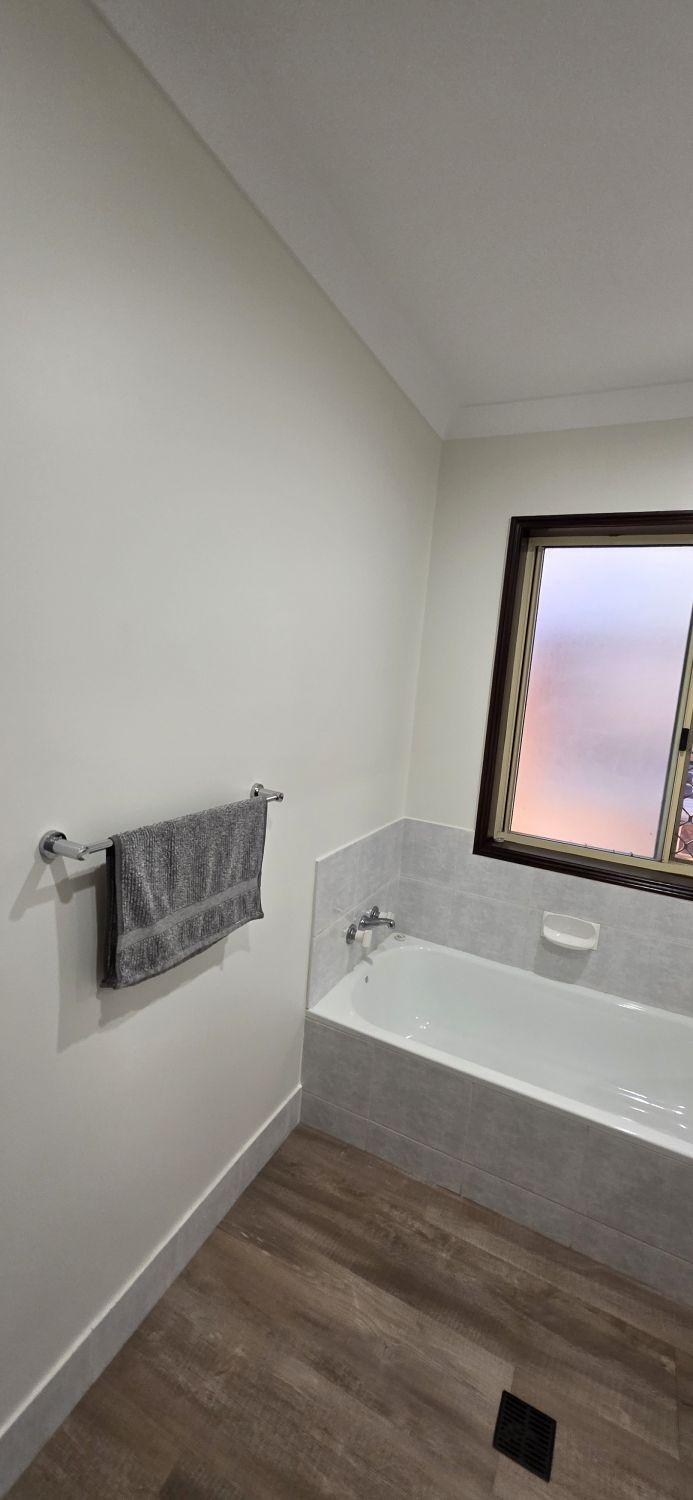 Original built-in bath in the Bellbowrie bathroom before renovation