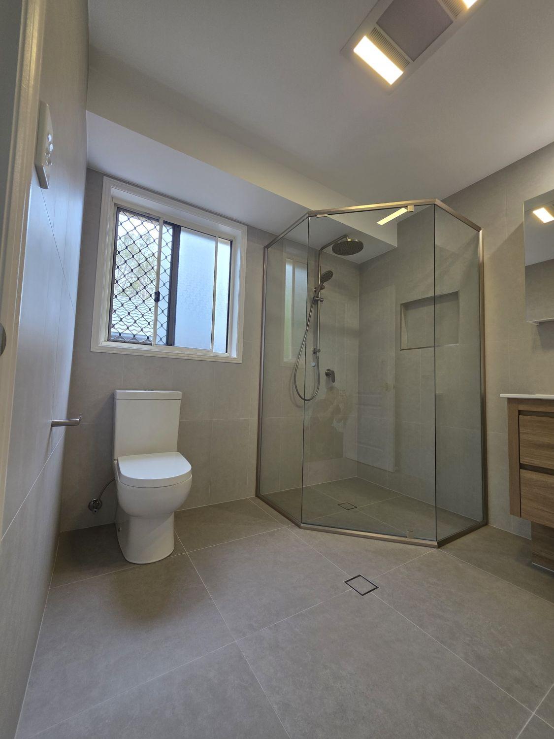Completed North Lakes ensuite with toilet and angled glass shower