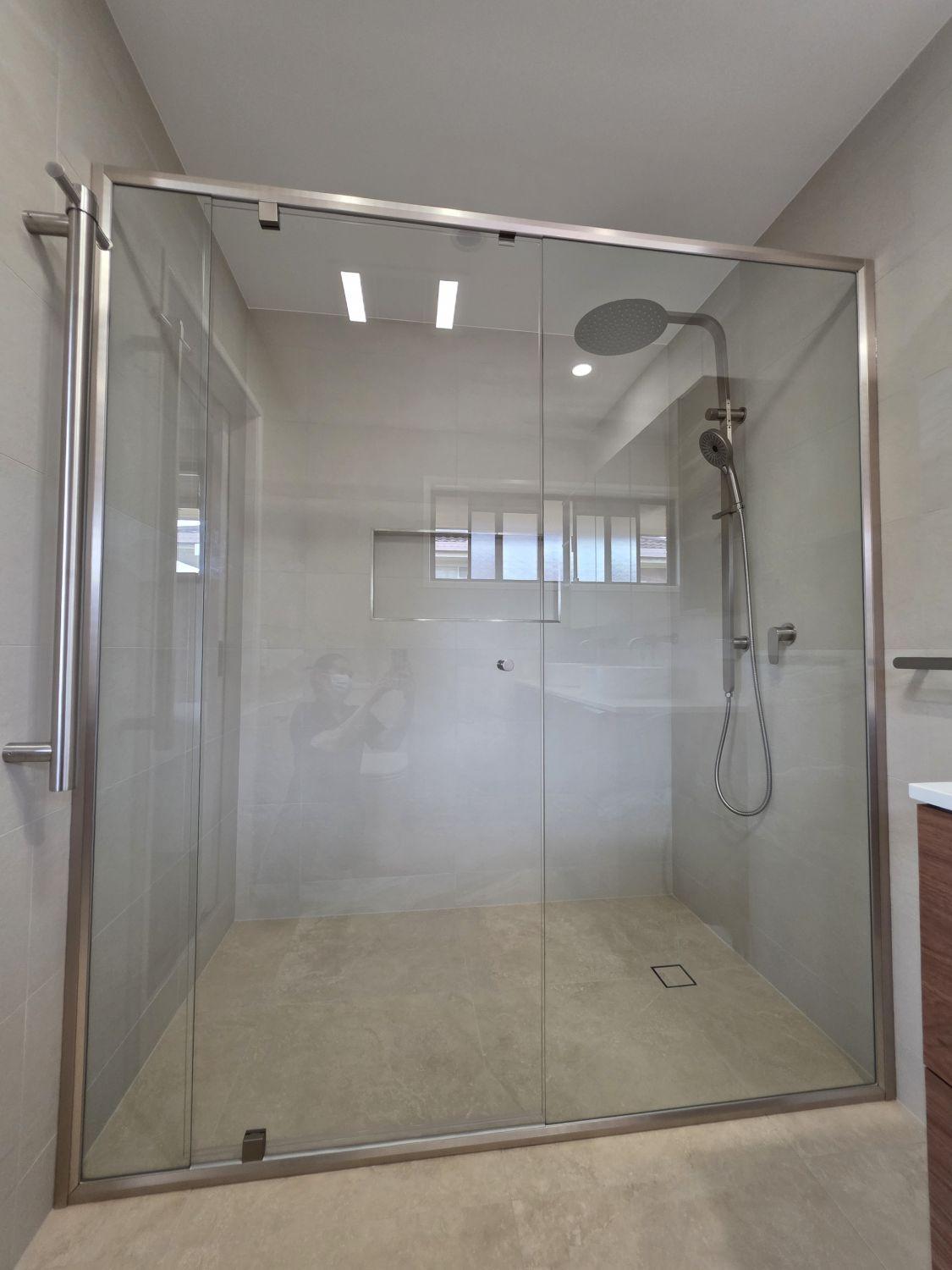 Large glass shower with dual fittings in the Wishart ensuite
