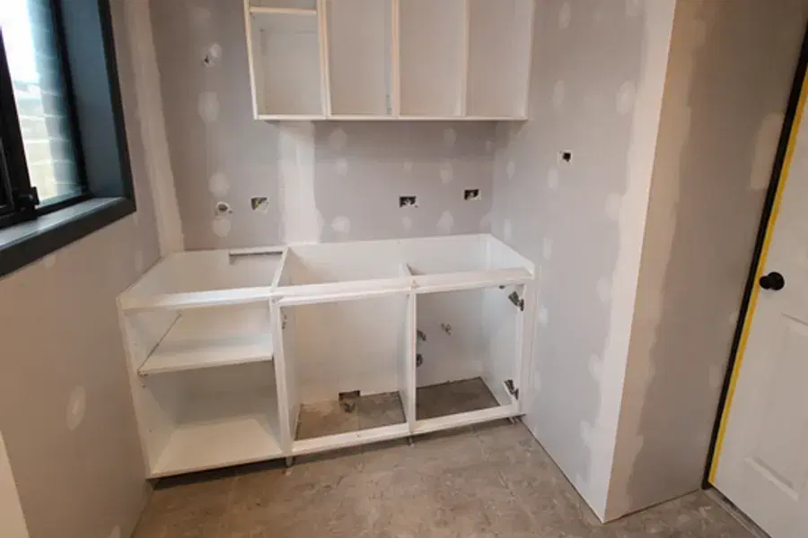 Sheet & install cabinetry stage of a laundry renovation in Brisbane
