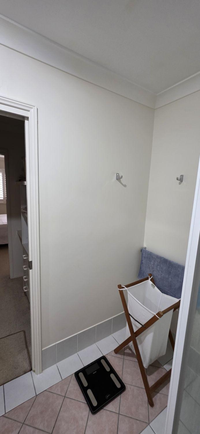 Unused wall and mixed floor tiles in the original Bardon bathroom