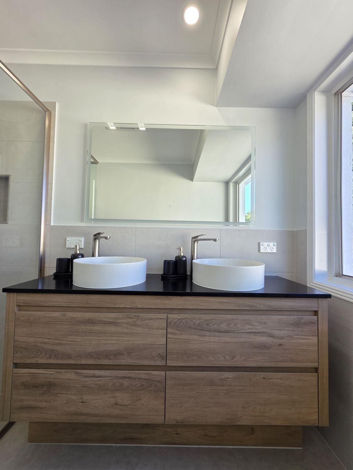 Double-basin timber-look vanity in the Calamvale bathroom