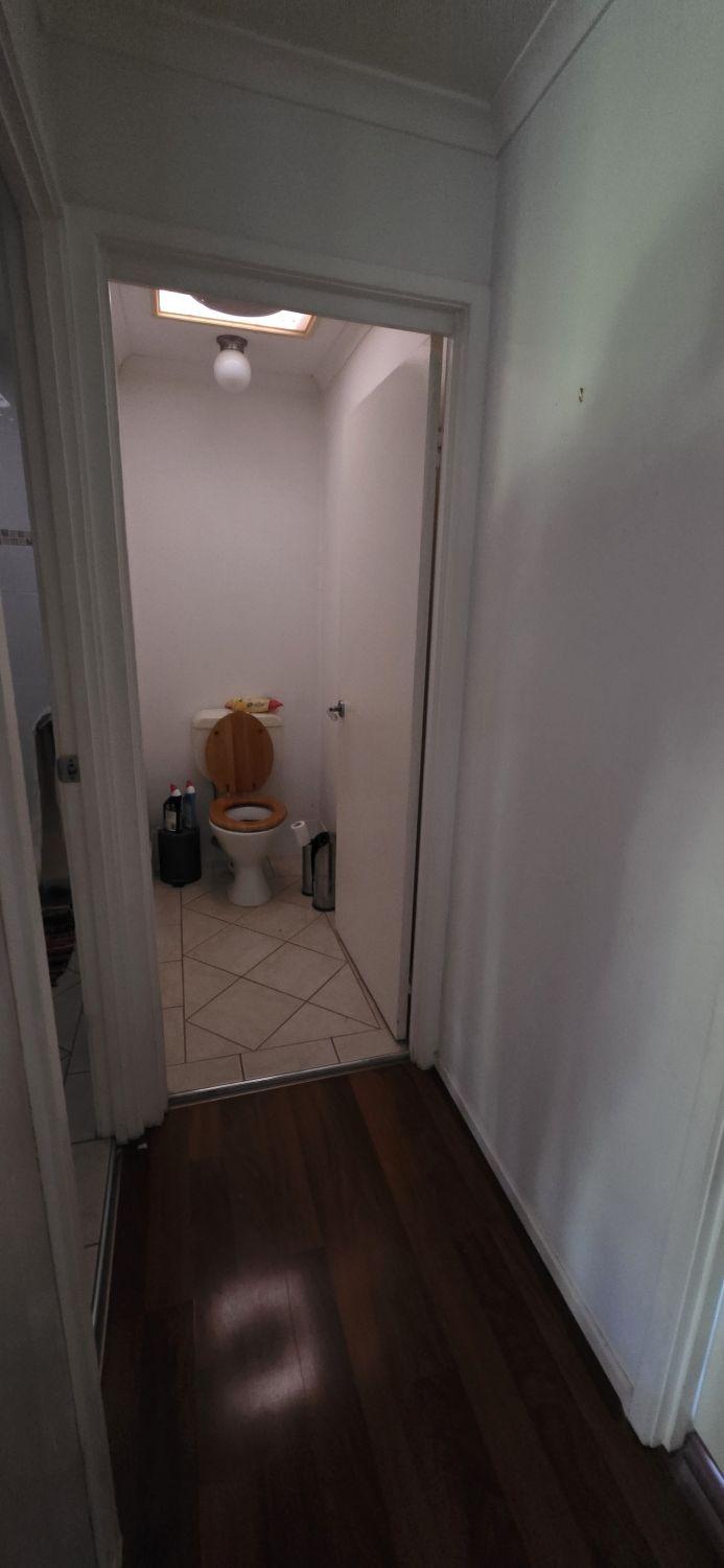 Narrow separate Holland Park toilet before renovation