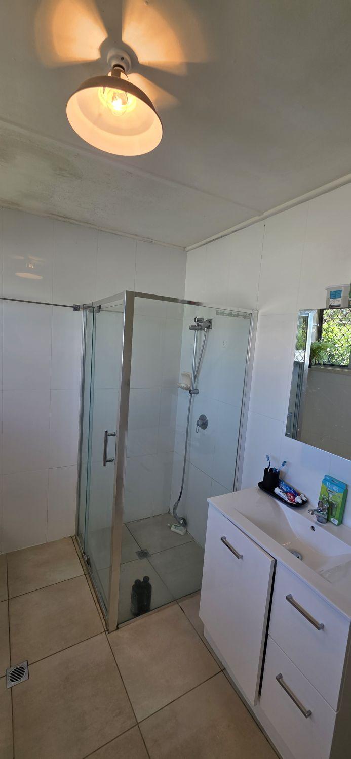 Framed shower in the Inala bathroom before renovation