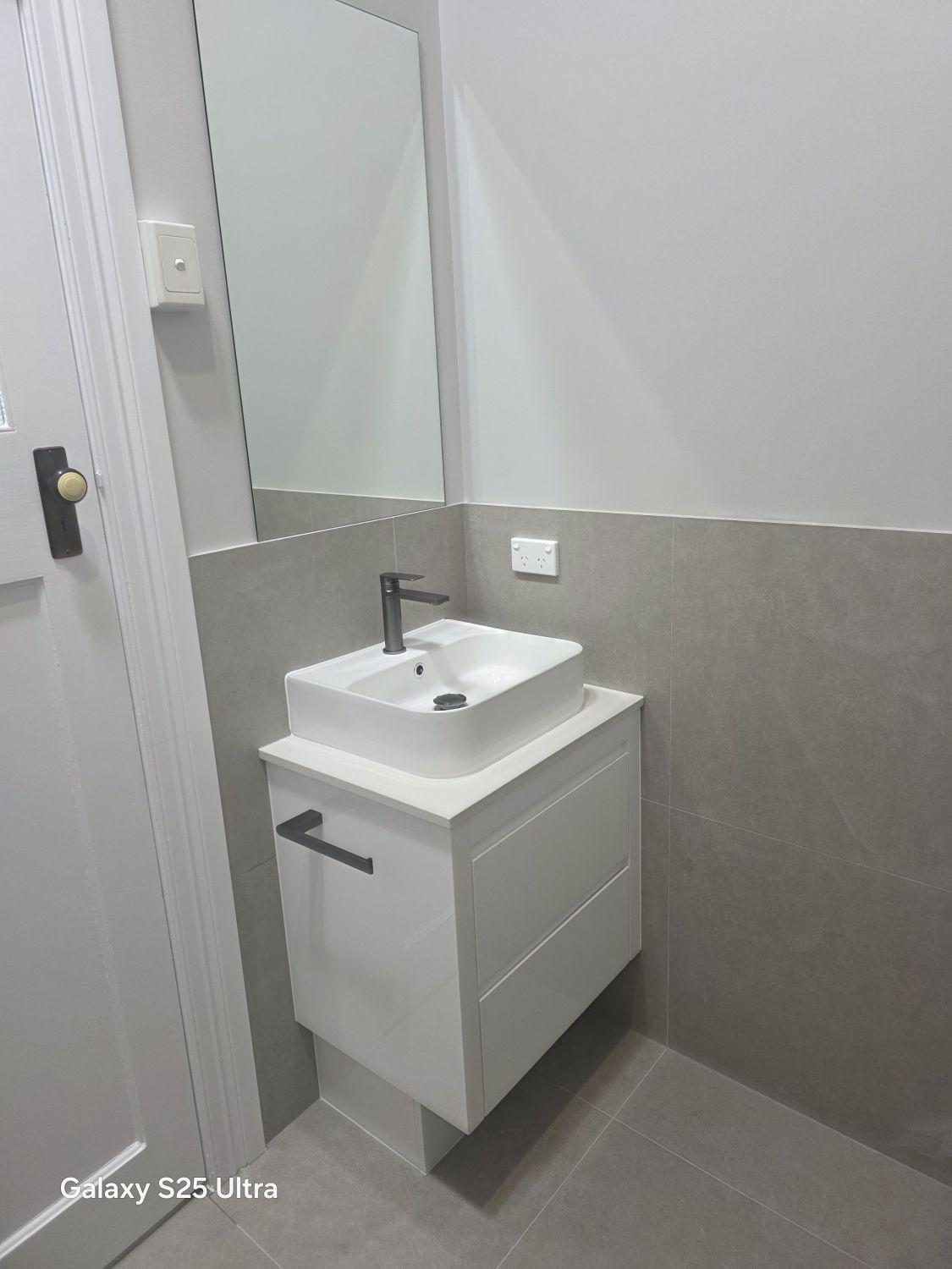 Compact second vanity in the completed Kalinga wet-area suite