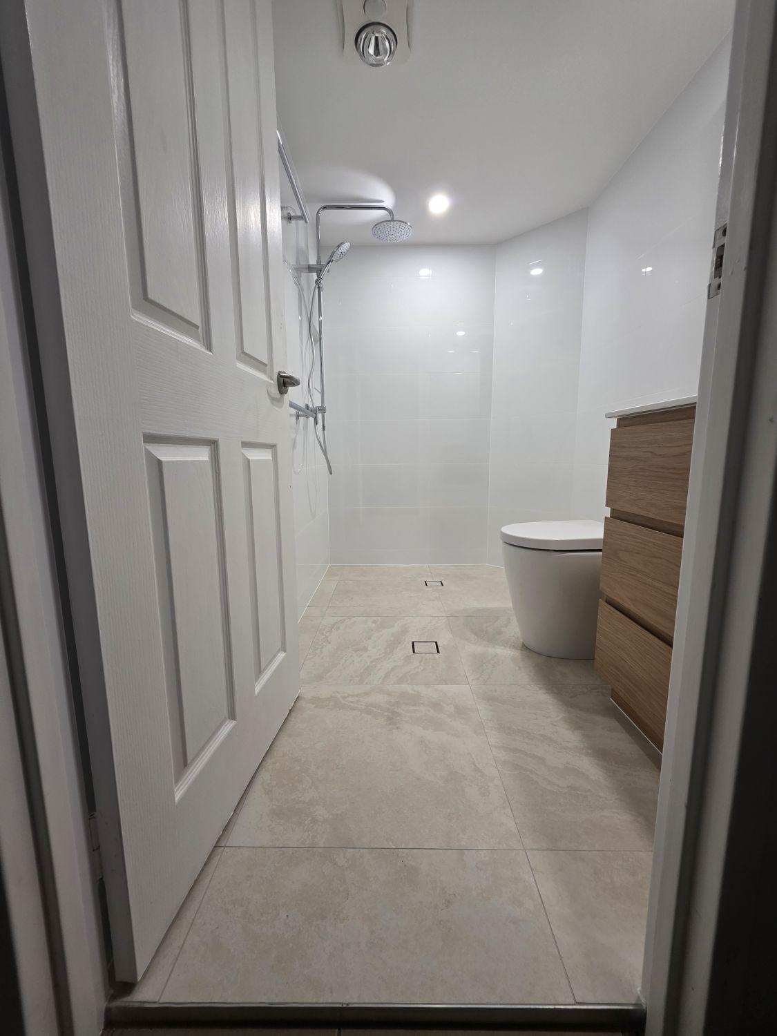 Taringa bathroom entrance after renovation with open level-entry shower