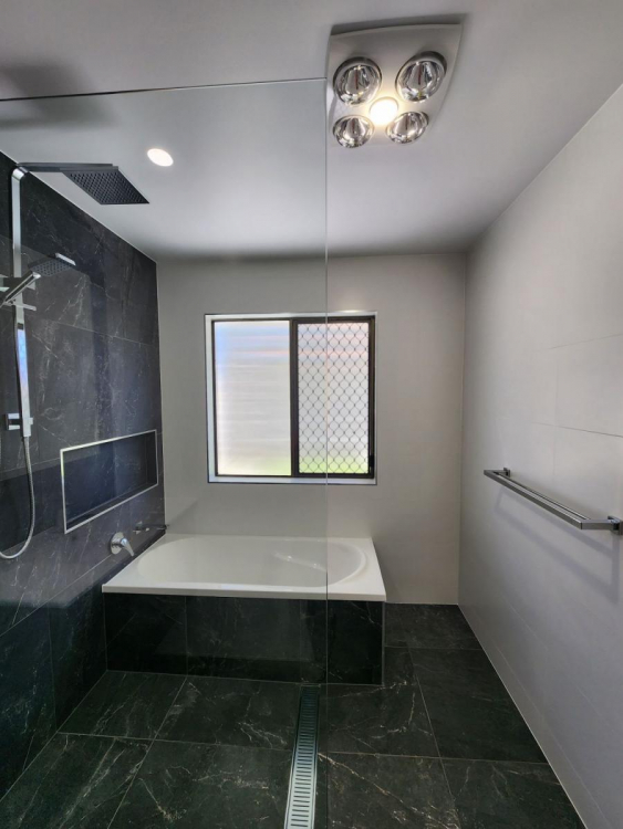 Stylishly renovated bathroom in Brisbane’s Carseldine suburb showcasing contemporary design, elegant fixtures, and bright, spacious interiors